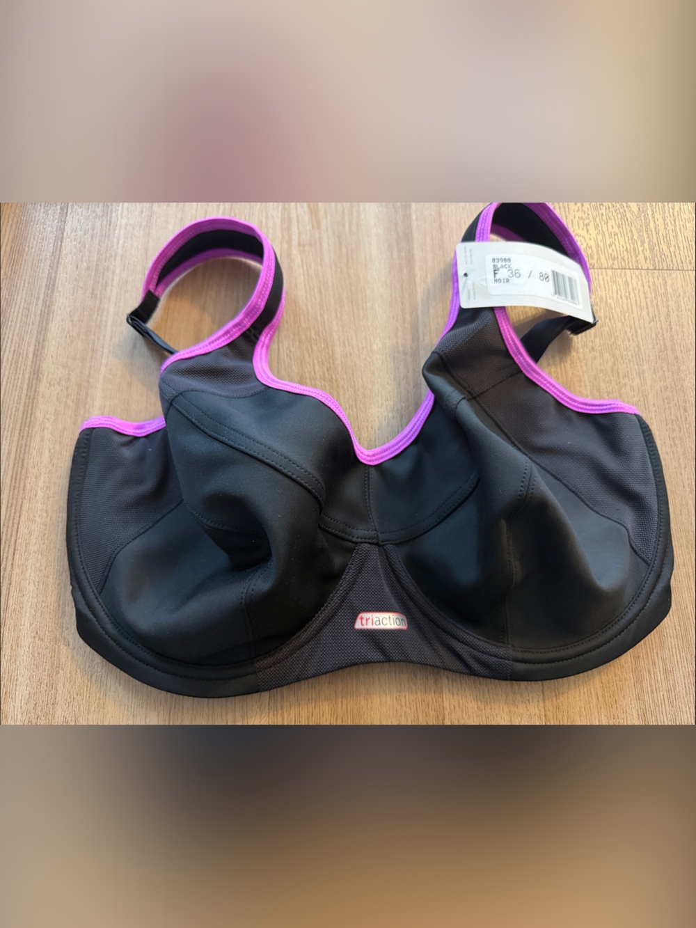 NWT Triumph Women’s Black Sports Bra with Pink Trim size 36F